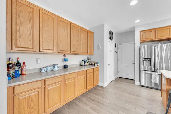 a living room with furniture fireplace and flat screen tv