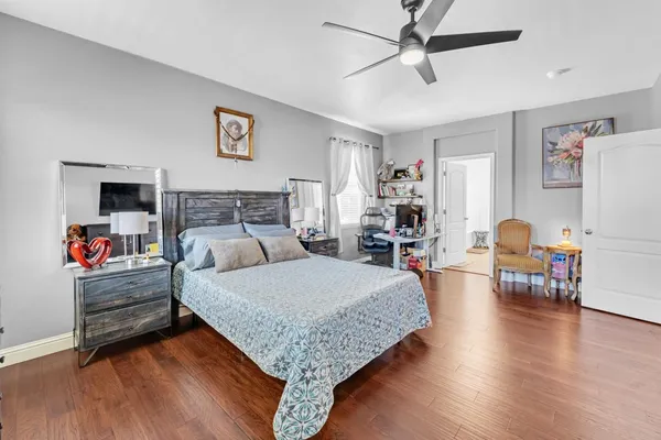 a bathroom with a sink vanity and a mirror