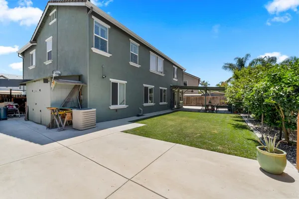a view of a chairs in wooden deck
