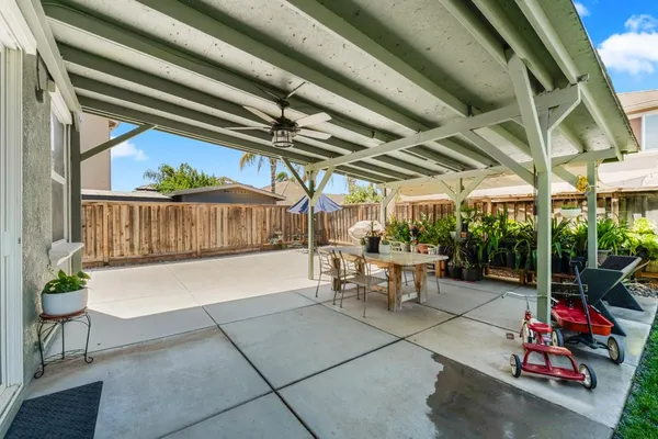 a view of a building with sitting area