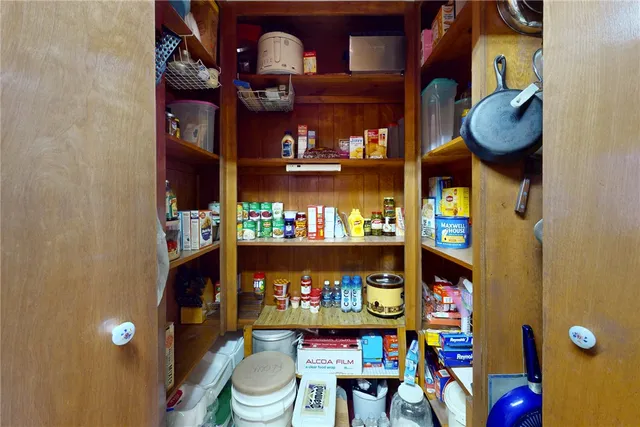 a room with lots of different colored cloths