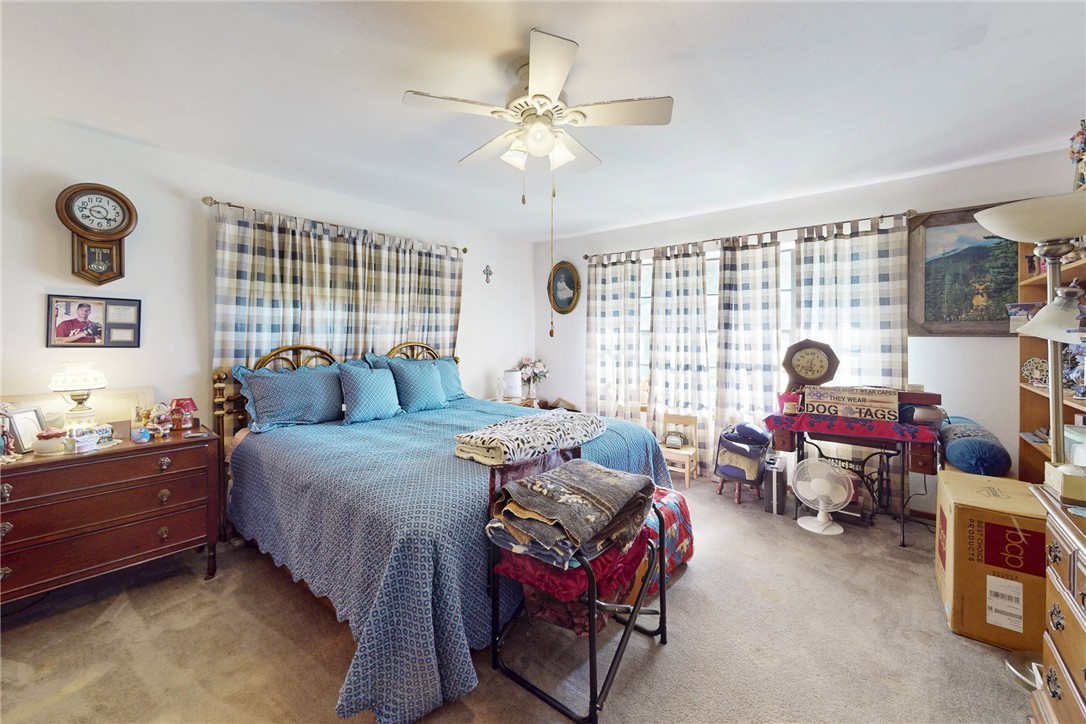 409 Morgan Street Franklin, TX 77856 - Photo 20 of 40 a bedroom with bed and a window