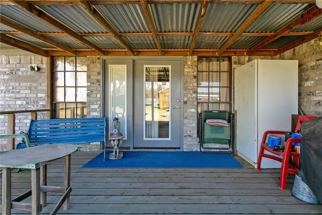 a view of livingroom with furniture wooden floor and windows