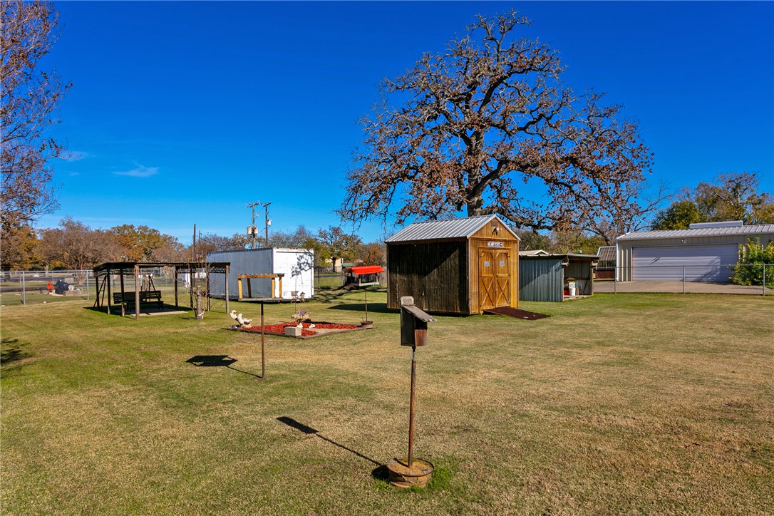 409 Morgan Street Franklin, TX 77856 - Photo 31 of 40 a sign board with yard in front of it