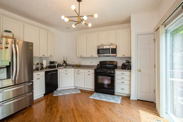 a room that has a rug and a window