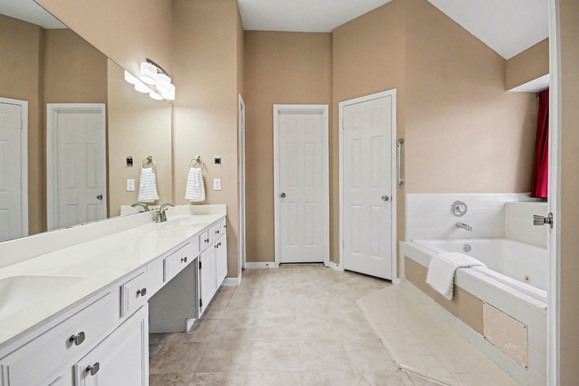 4206 River Ranch Drive Pasadena, TX 77505 - Photo 23 of 38 Primary Bathroom W/New Vanity Lights and Fixtures