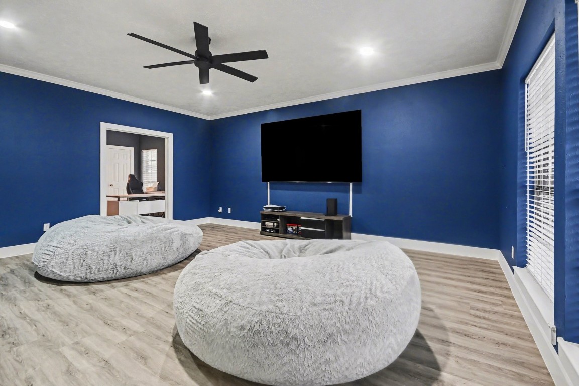 4206 River Ranch Drive Pasadena, TX 77505 - Photo 10 of 38 2nd Living Room or Gameroom - 100'' TV Stays W/Home - Luxury Vinyl Plank Flooring