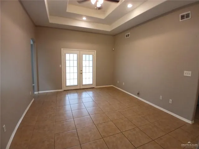 a kitchen with a sink a counter top space and cabinets