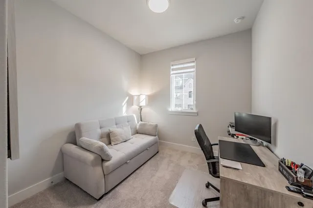 a bedroom with a bed and furniture