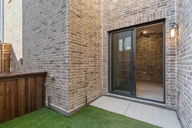 a view of outdoor space with sliding door