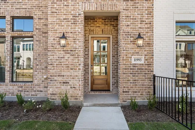 a brick house with a large windows