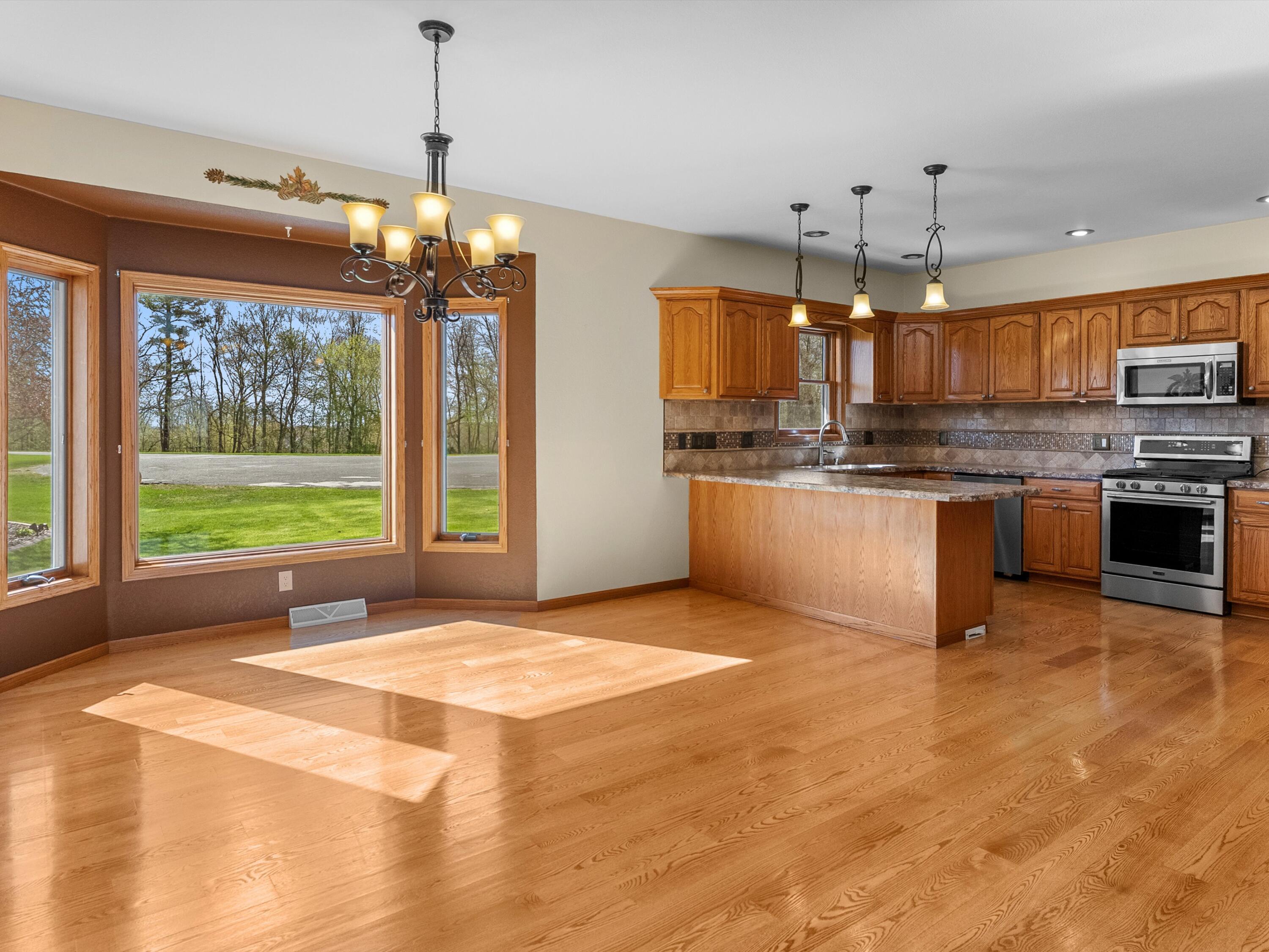 4818 Maplecrest Ridge Road Franklin, WI 54247 - Photo 11 of 62 Sun Filled Kitchen and Dining