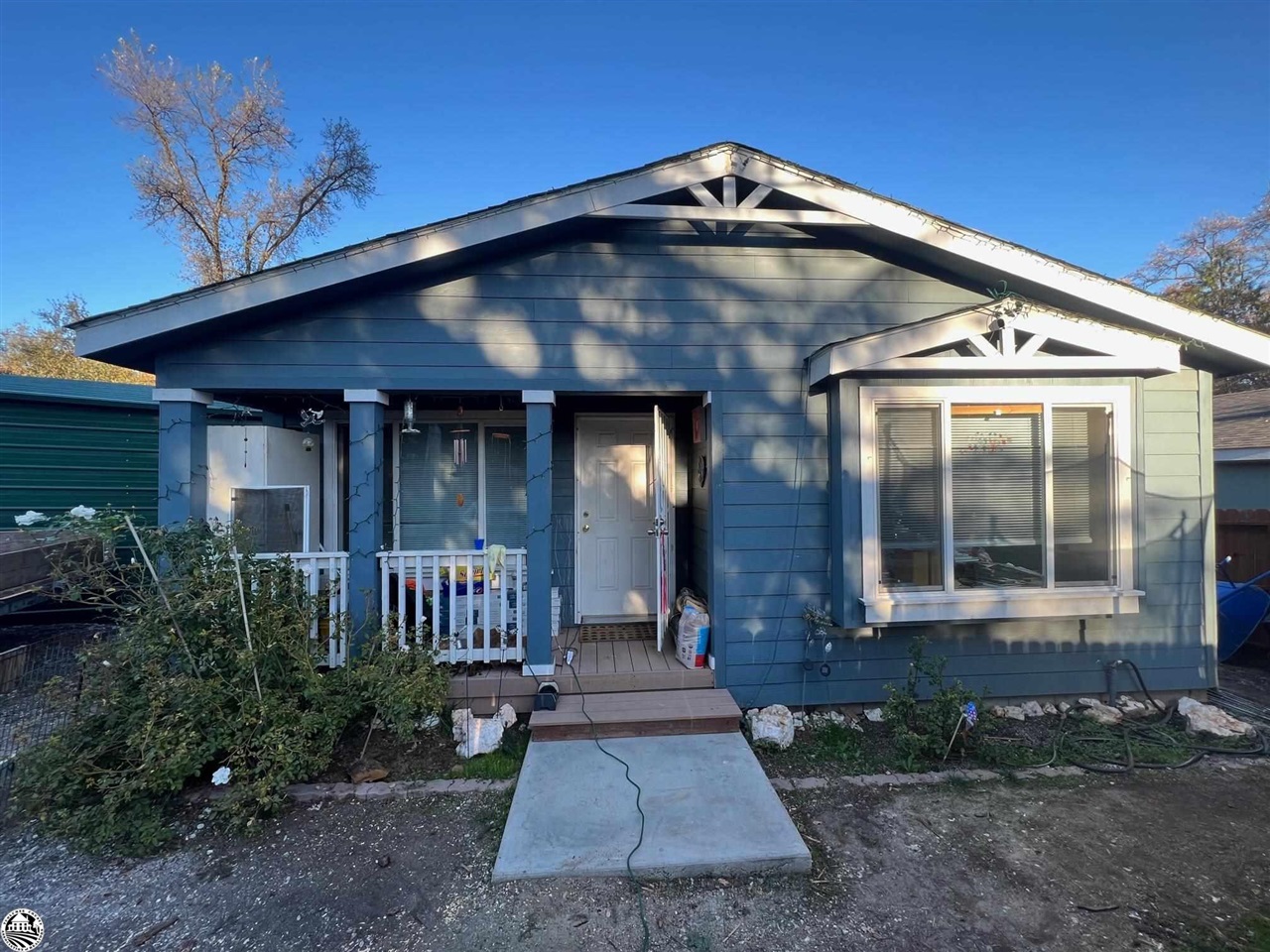 22915 Hudson Road Columbia, CA 95310 - Photo 1 of 1 a front view of a house with garden