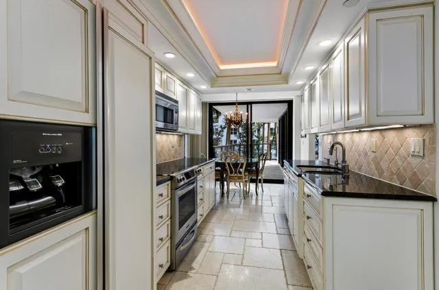 a kitchen with granite countertop lots of counter top space