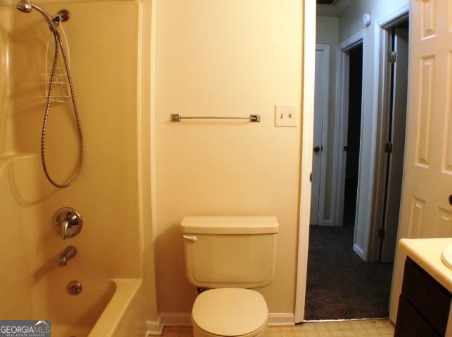 118 Whipoorwill Way Dublin, GA 31021 - Photo 20 of 28 a bathroom with a toilet and a shower