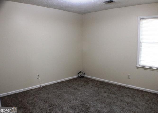 118 Whipoorwill Way Dublin, GA 31021 - Photo 22 of 28 an empty room with a window