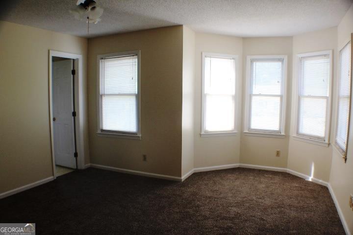 118 Whipoorwill Way Dublin, GA 31021 - Photo 27 of 28 a view of an empty room with a window
