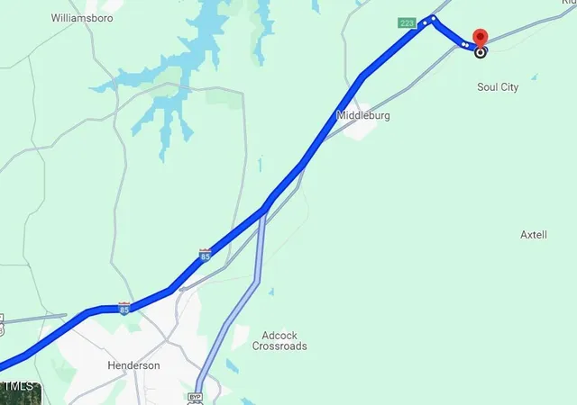 a building outdoor space with lots of green space