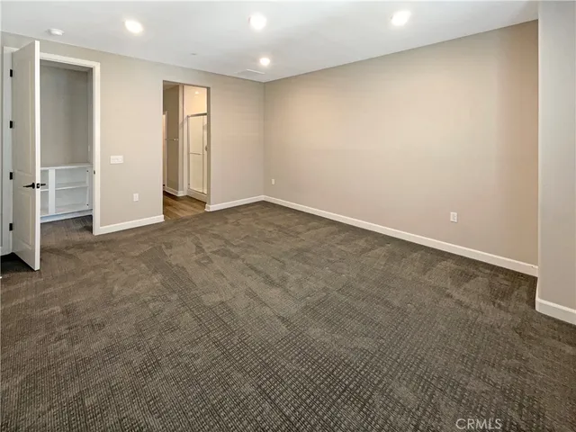 a bathroom with a double vanity sink and mirror