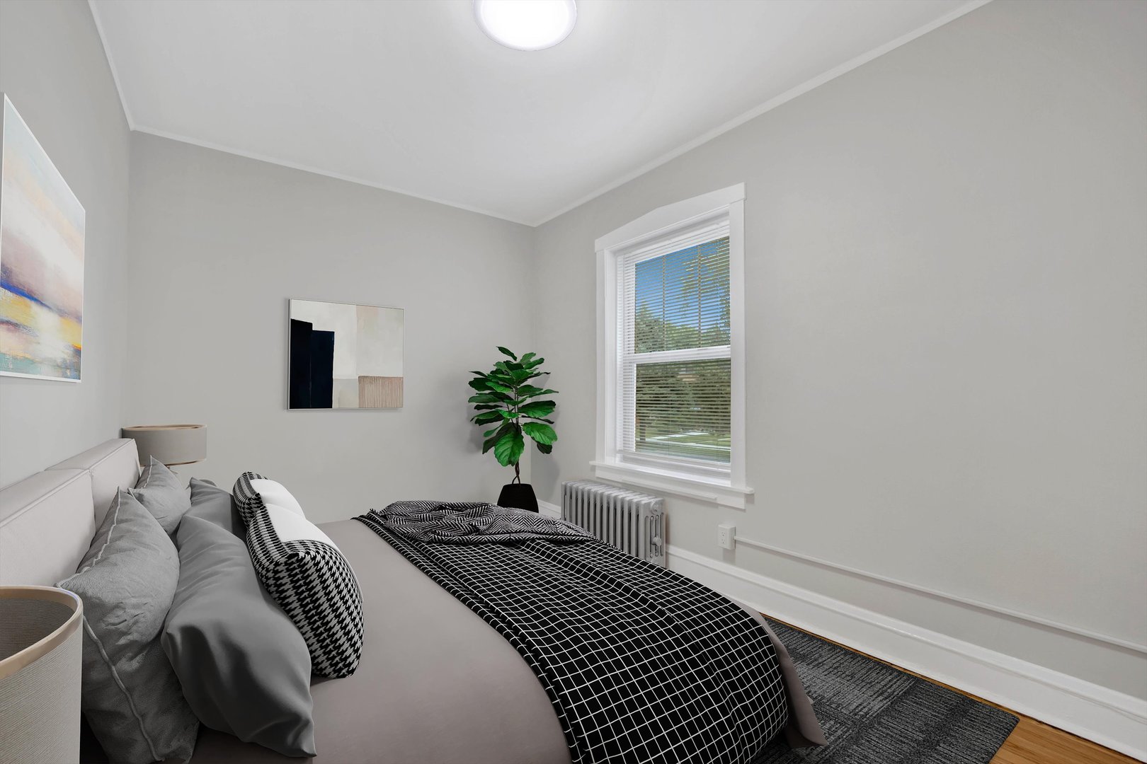 4744 West Roscoe Street, Unit 2 Chicago, IL 60641 - Photo 4 of 14 a bedroom with a bed and a window