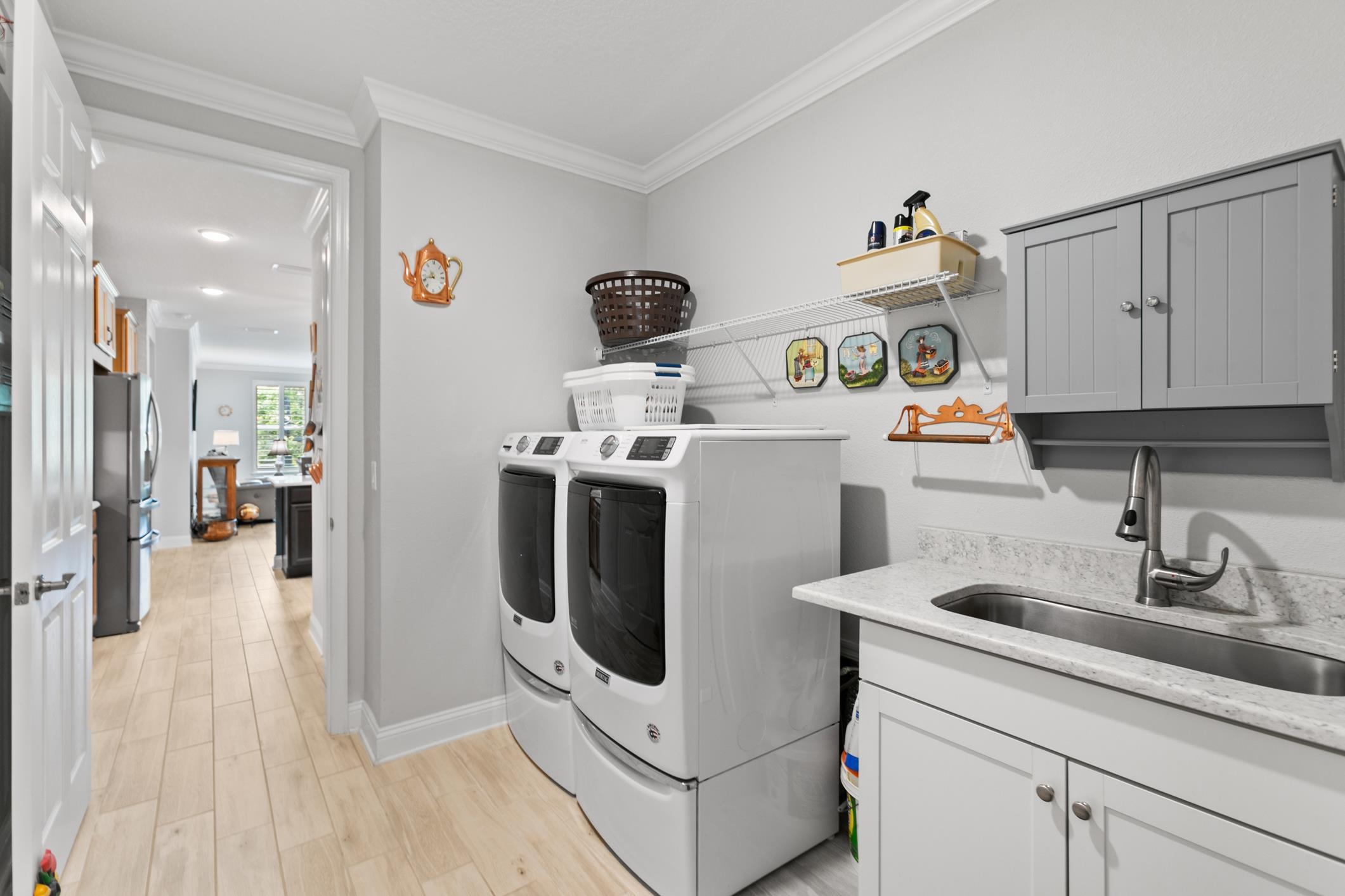 106 Key Grass Court St. Johns, FL 32259 - Photo 16 of 98 a kitchen with a sink and a stove top oven