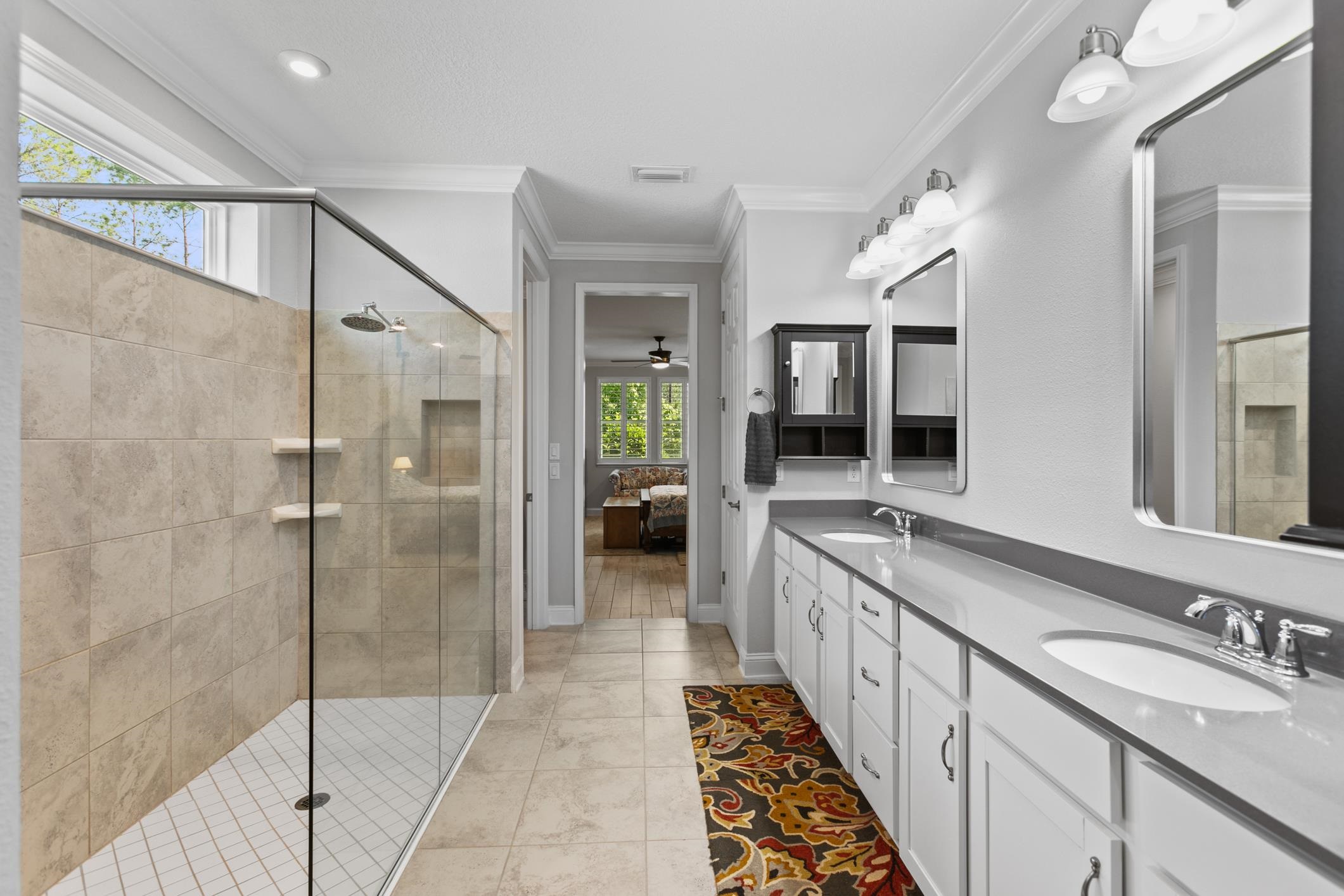 106 Key Grass Court St. Johns, FL 32259 - Photo 18 of 98 a bathroom with a double vanity sink and mirror
