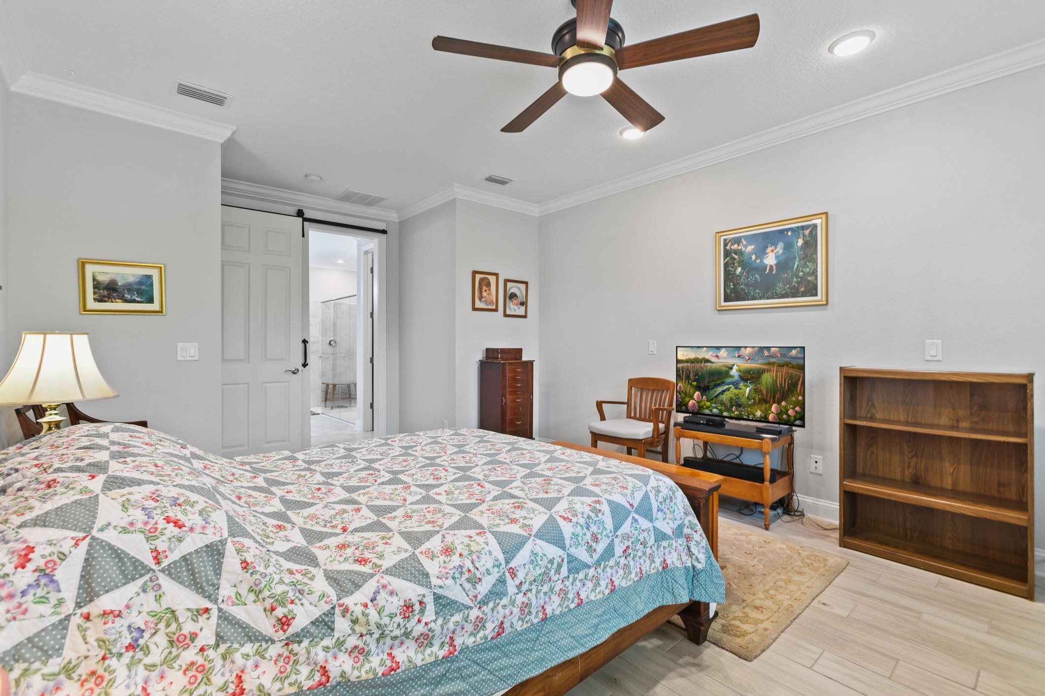 106 Key Grass Court St. Johns, FL 32259 - Photo 23 of 98 a bedroom with a bed and a chandelier