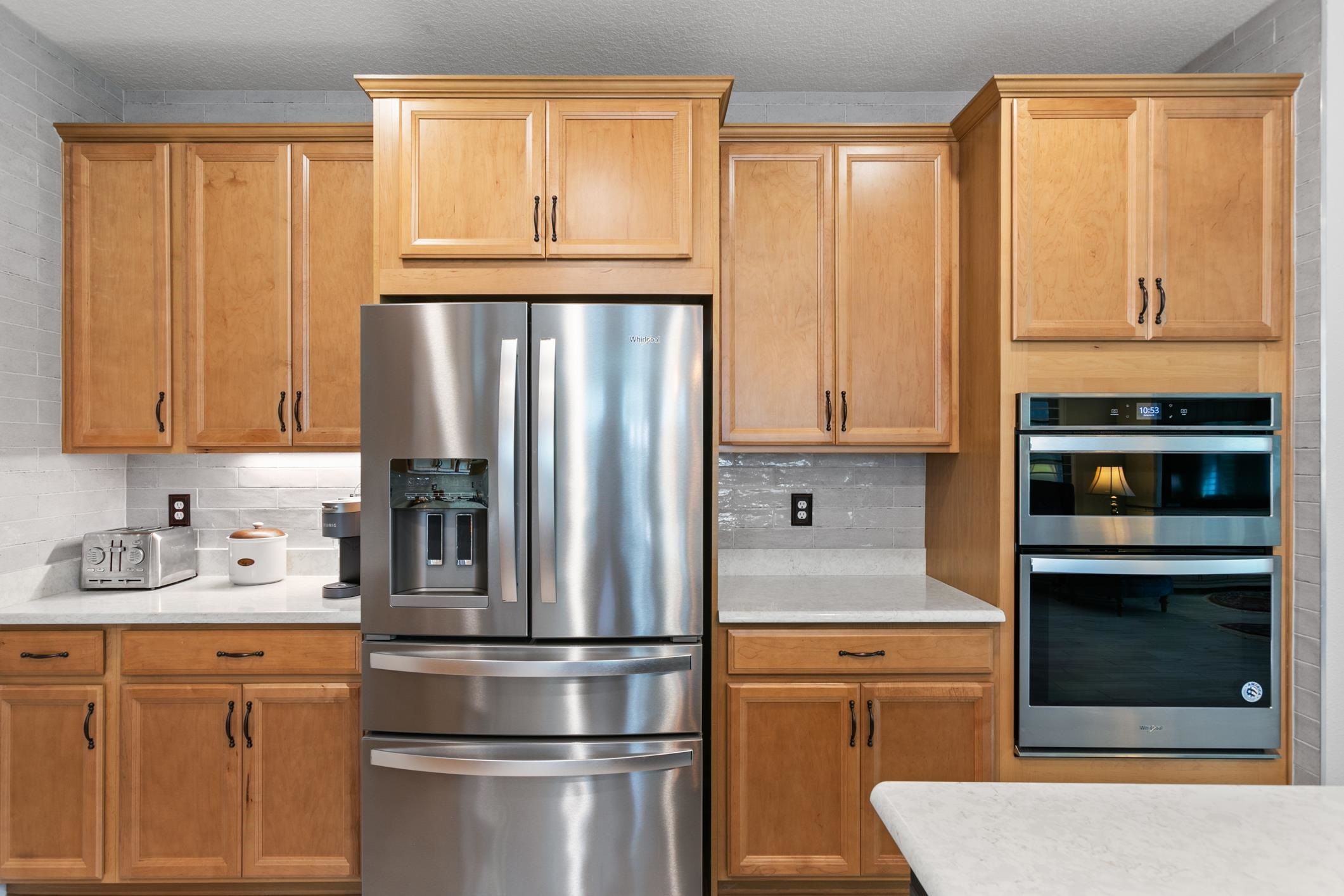 106 Key Grass Court St. Johns, FL 32259 - Photo 26 of 98 a kitchen with stainless steel appliances granite countertop a refrigerator sink and cabinets