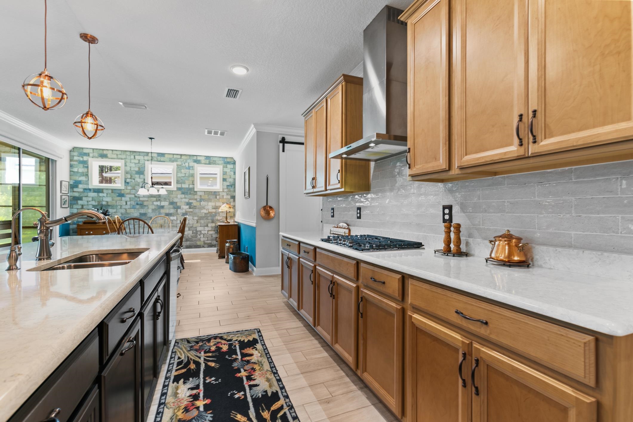 106 Key Grass Court St. Johns, FL 32259 - Photo 28 of 98 a kitchen with stainless steel appliances granite countertop a sink stove and cabinets