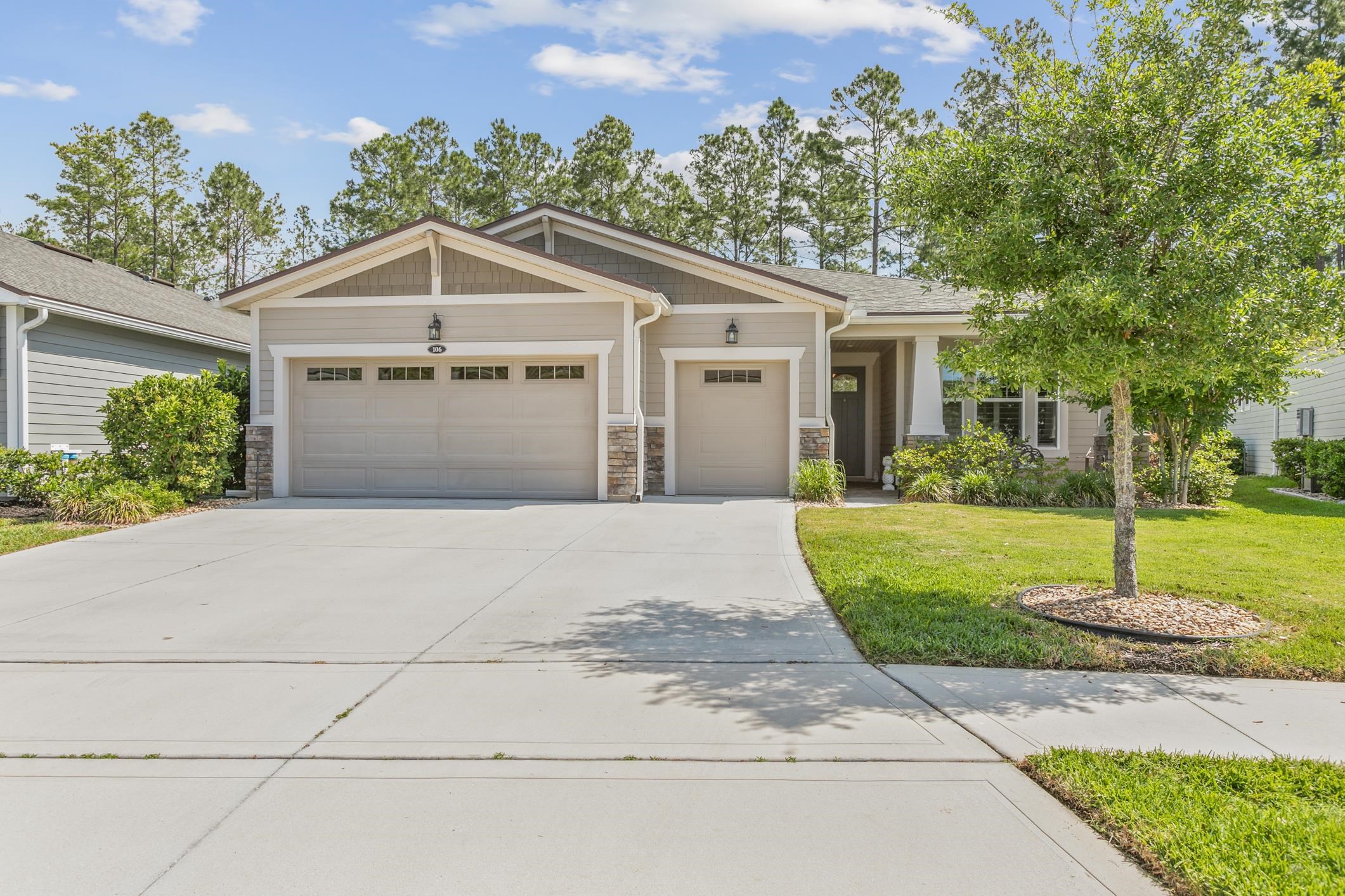 106 Key Grass Court St. Johns, FL 32259 - Photo 49 of 98 a front view of a house with a yard and trees