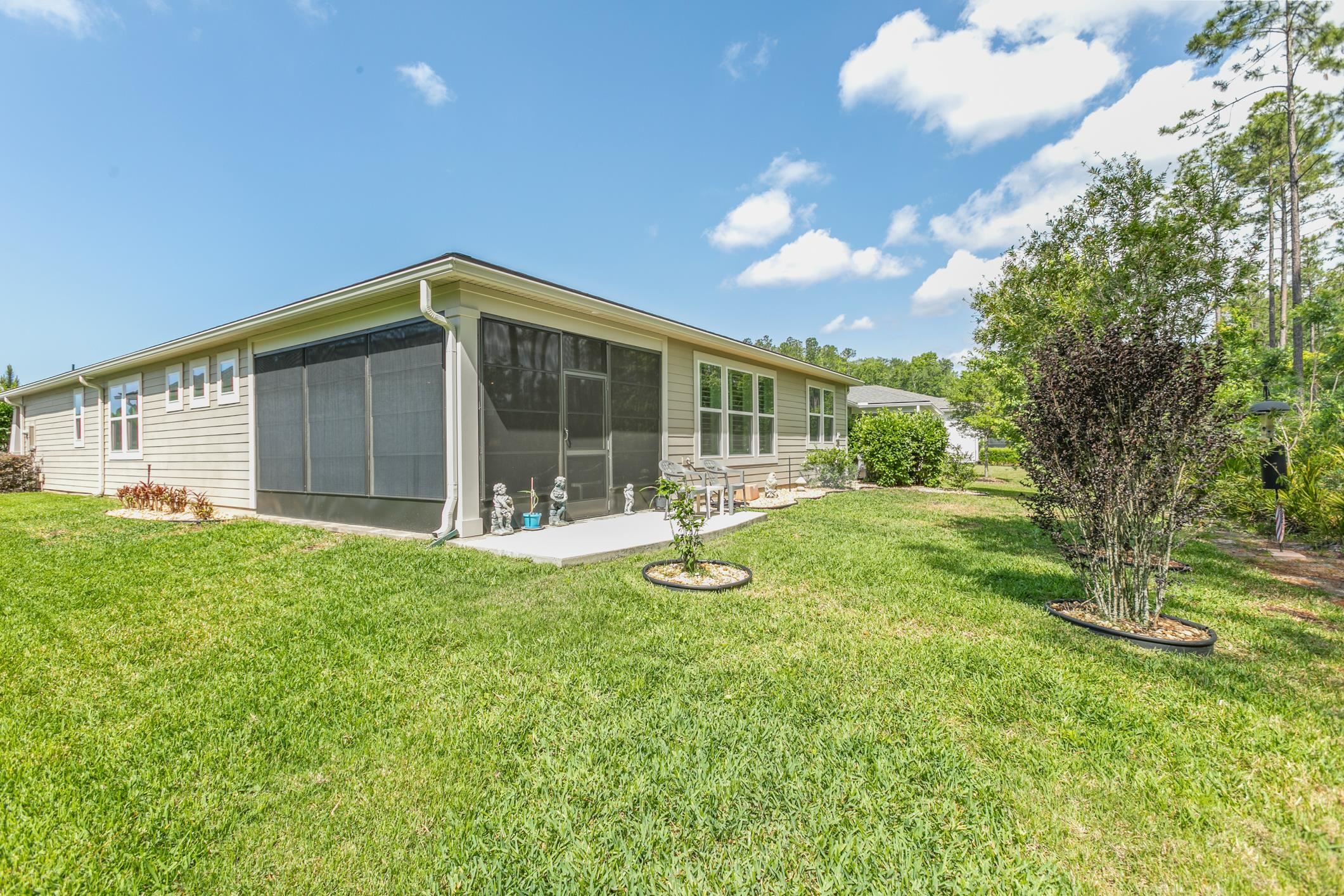 106 Key Grass Court St. Johns, FL 32259 - Photo 54 of 98 a view of an house with backyard and porch