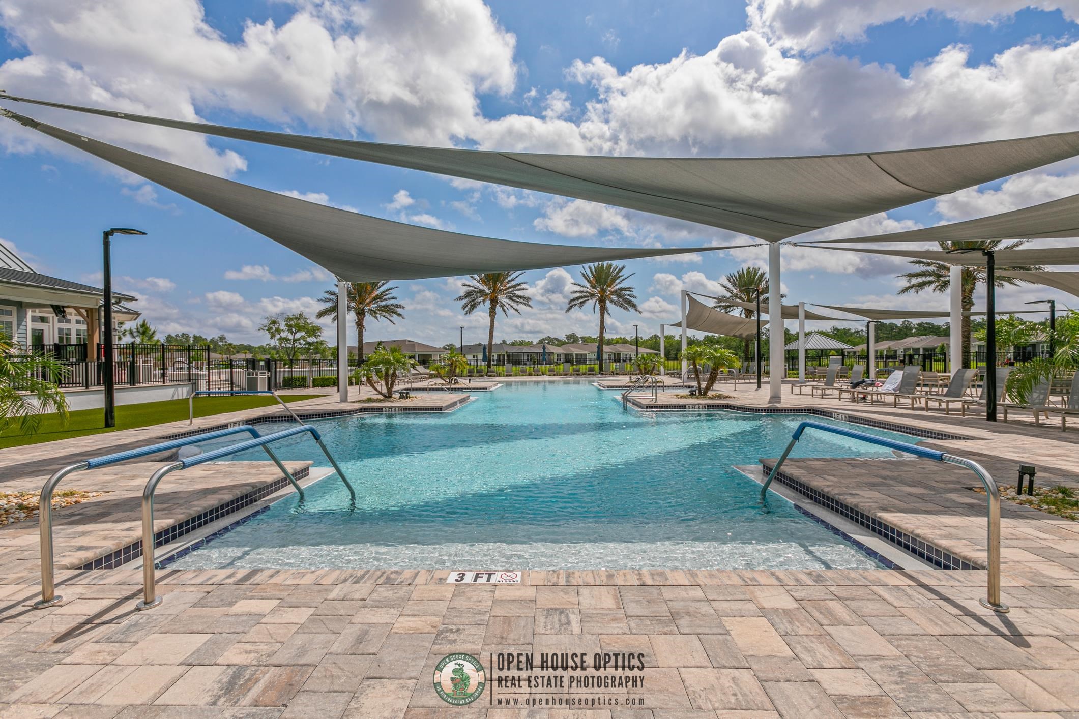 106 Key Grass Court St. Johns, FL 32259 - Photo 90 of 98 a view of a swimming pool with seating space