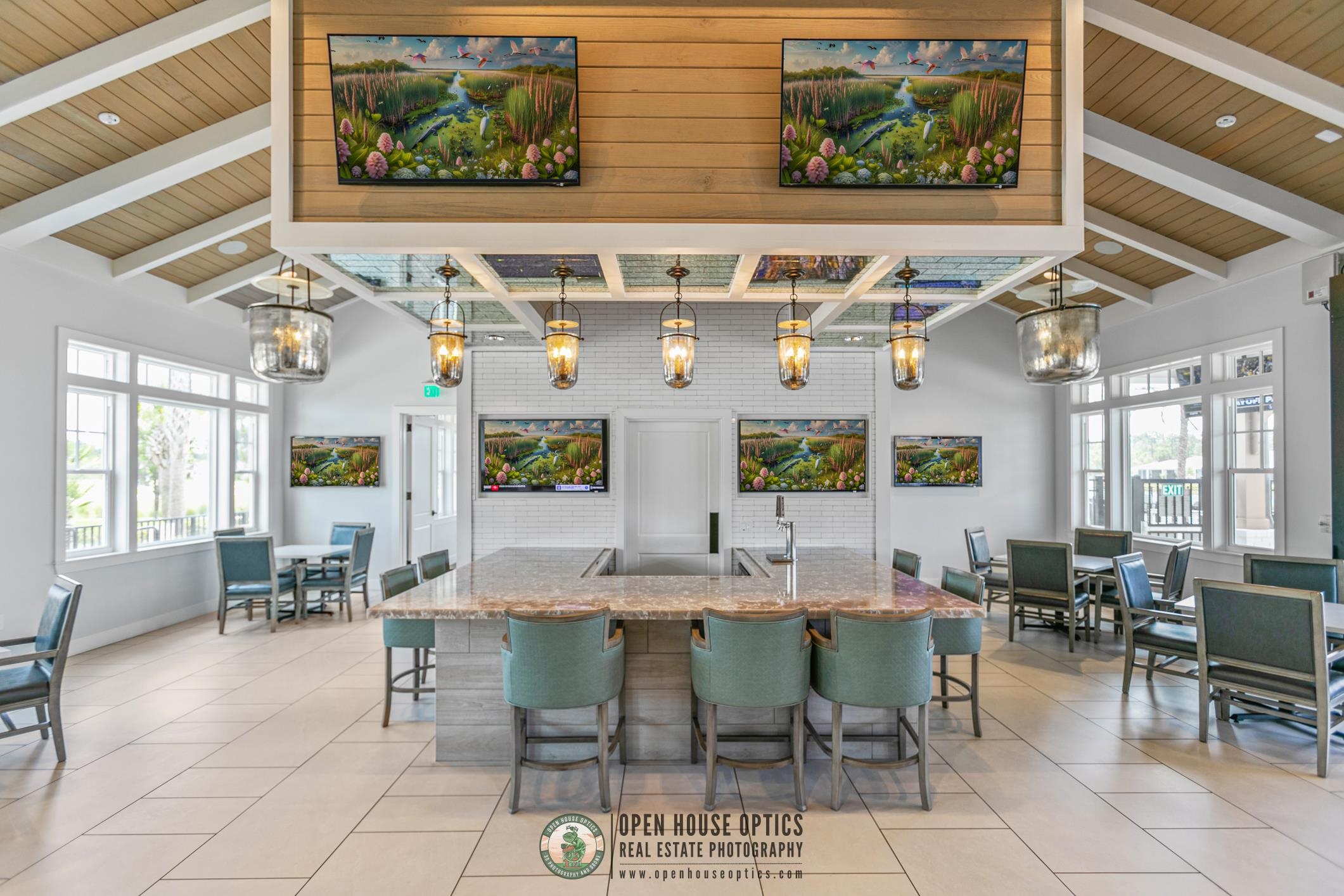 106 Key Grass Court St. Johns, FL 32259 - Photo 95 of 98 a view of a dining hall with couches a dining table and chairs with kitchen view