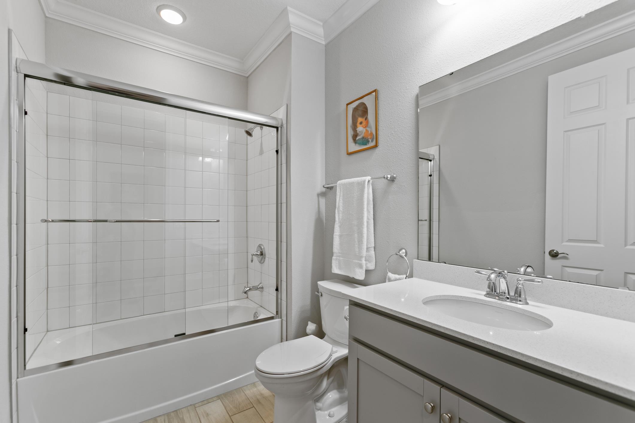 106 Key Grass Court St. Johns, FL 32259 - Photo 10 of 98 a bathroom with a granite countertop sink toilet and shower