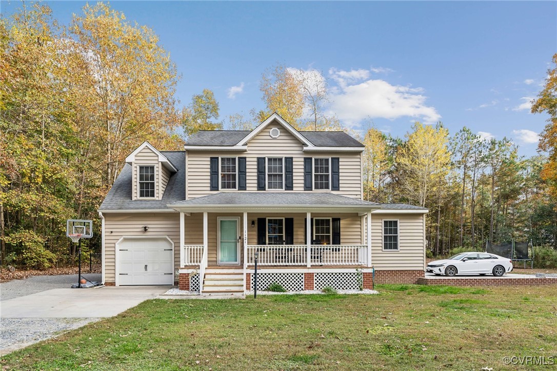1121 Coachpoint Road Hartfield, VA 23071 - Photo 1 of 46 View of front of home with a porch, a front yard,