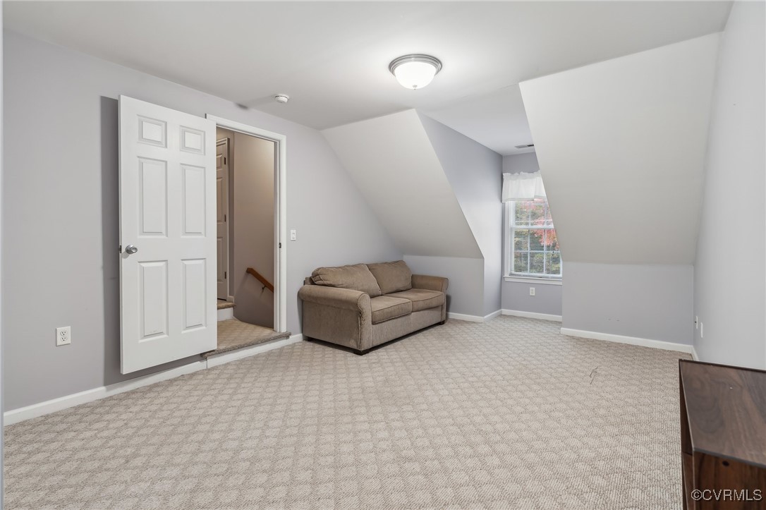 1121 Coachpoint Road Hartfield, VA 23071 - Photo 23 of 46 Additional living space featuring light colored ca