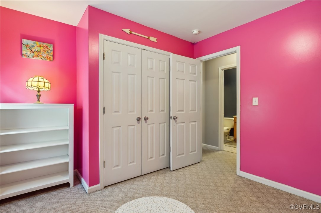 1121 Coachpoint Road Hartfield, VA 23071 - Photo 29 of 46 Bedroom featuring light colored carpet