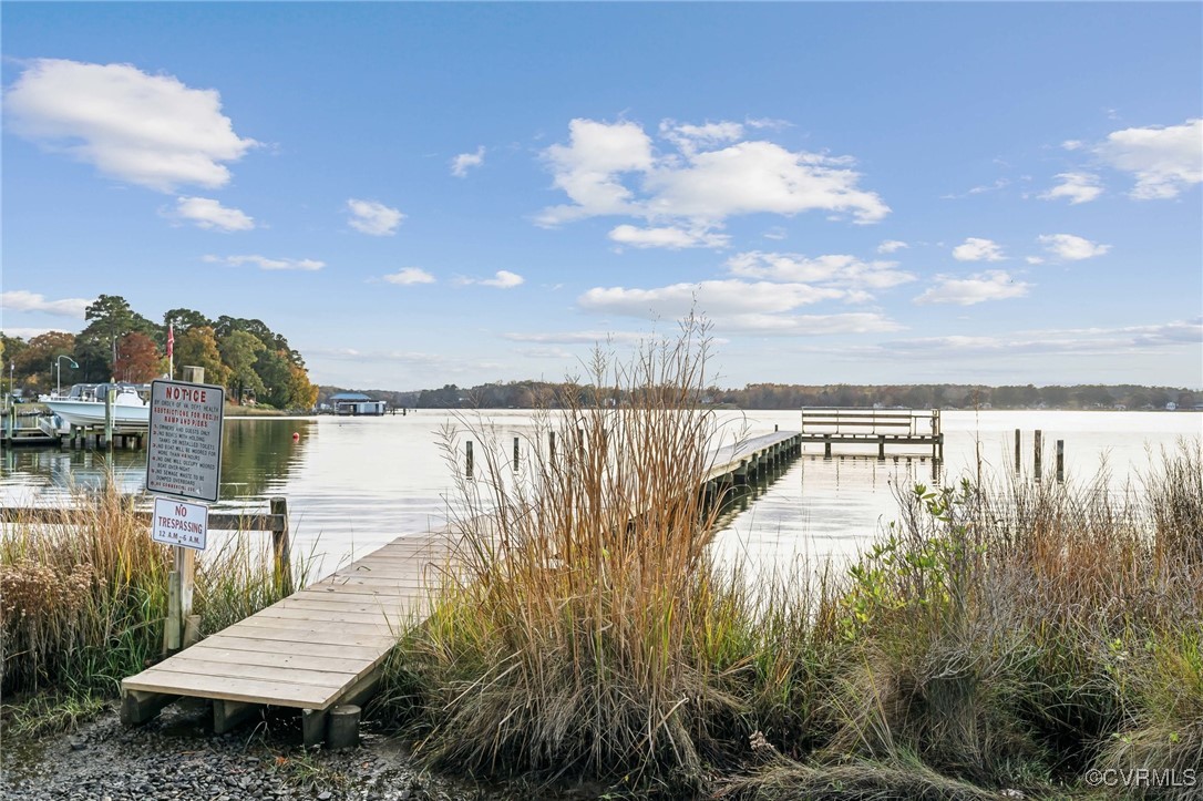1121 Coachpoint Road Hartfield, VA 23071 - Photo 45 of 46 Dock area featuring a water view