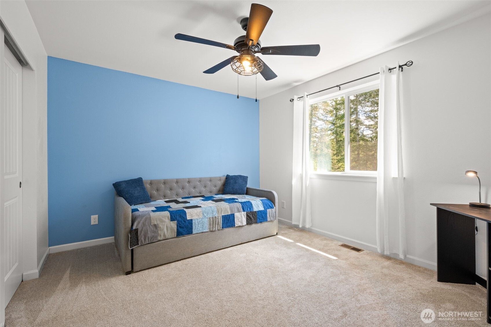 401 East Sunset Ridge Road Union, WA 98592 - Photo 19 of 37 a bedroom with furniture and windows