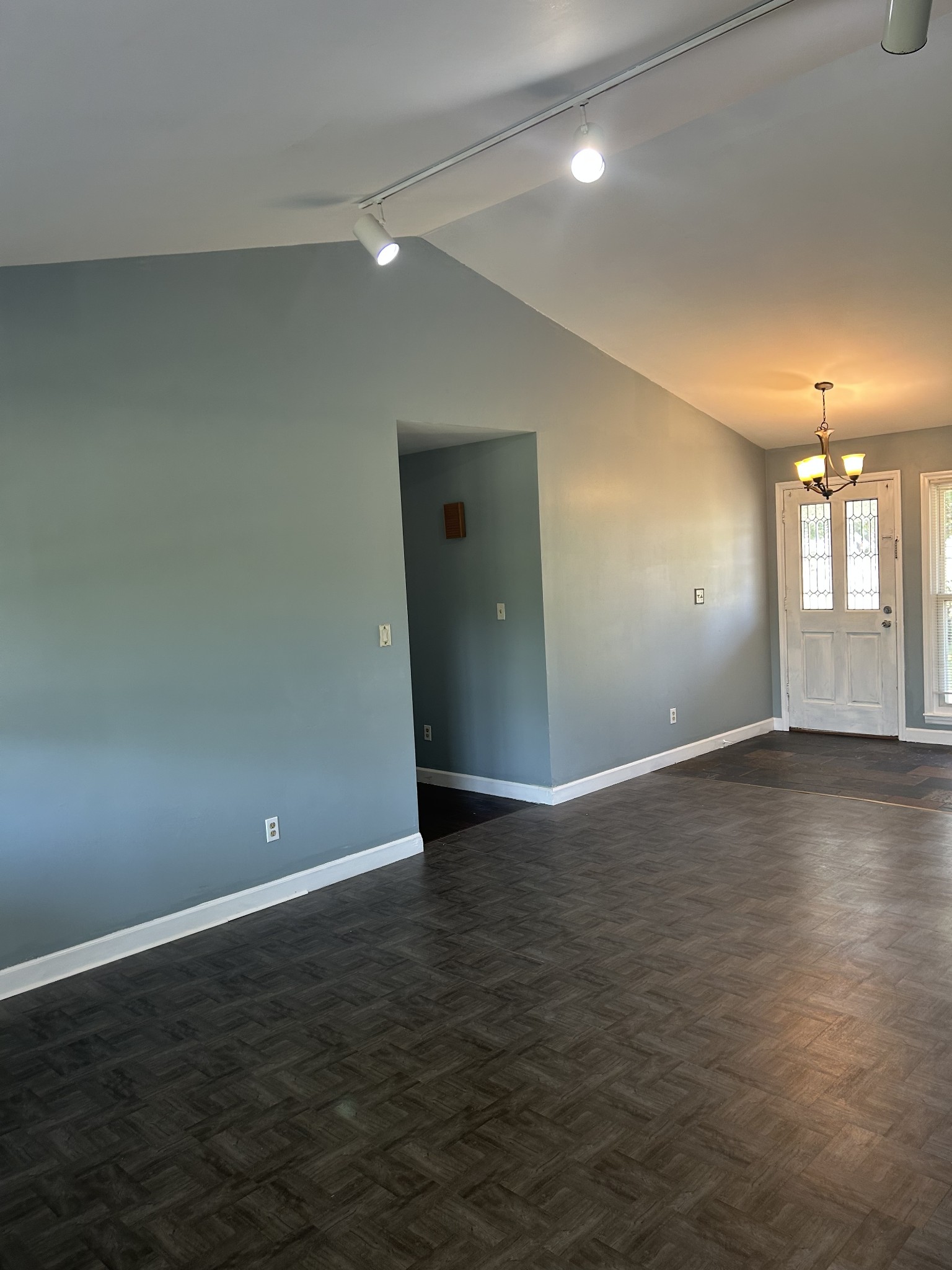 4264 Port Royal Road Spring Hill, TN 37174 - Photo 11 of 14 an empty room with wooden floor and windows