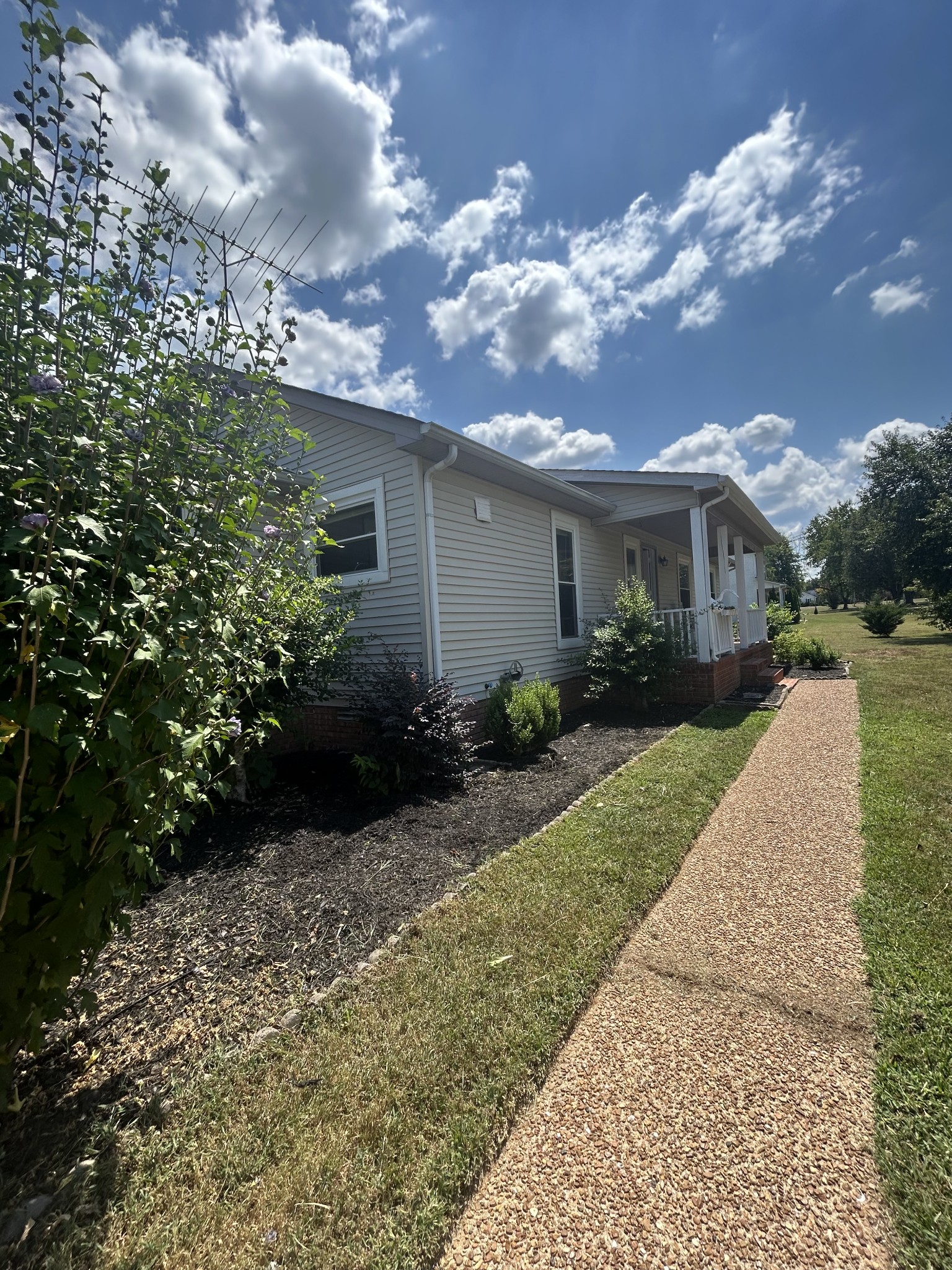 4264 Port Royal Road Spring Hill, TN 37174 - Photo 2 of 14 a view of a house with a yard