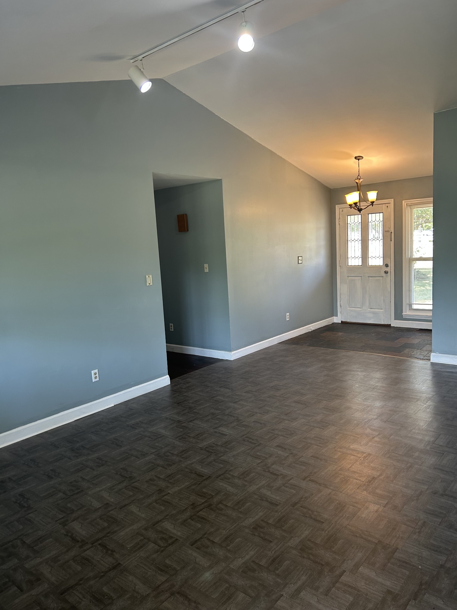 4264 Port Royal Road Spring Hill, TN 37174 - Photo 3 of 14 an empty room with wooden floor and windows