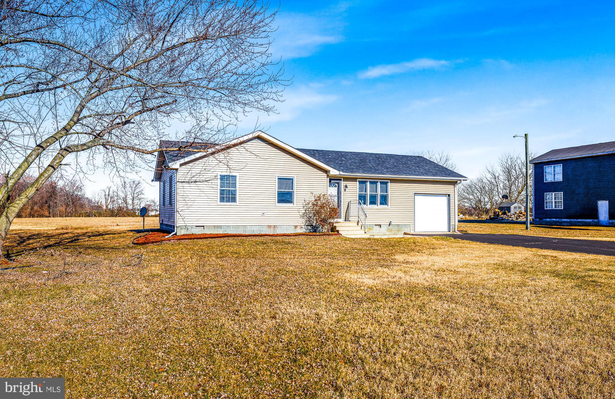 22041 Neal Road Lincoln, DE 19960 - Photo 27 of 28 a view of a house with yard and tree