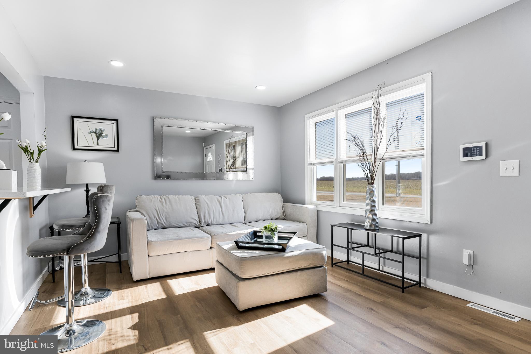 22041 Neal Road Lincoln, DE 19960 - Photo 4 of 28 a living room with furniture and a large window