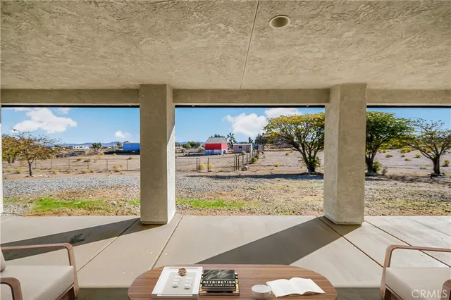 a view of a living room and window