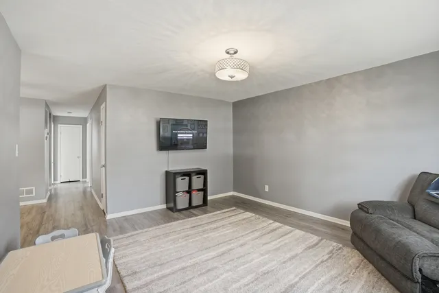 a bedroom with a bed and furniture