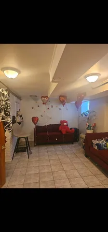 a black and white photo of a kitchen