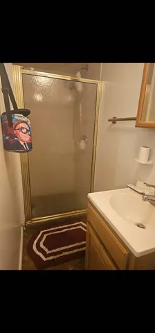 a bathroom with a toilet and a sink