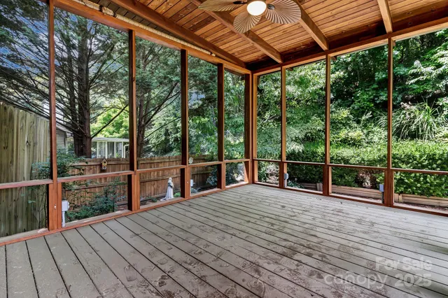 a house with wooden floor and outdoor space
