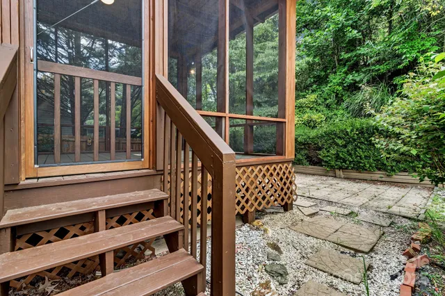 a view of a wooden house with a large window